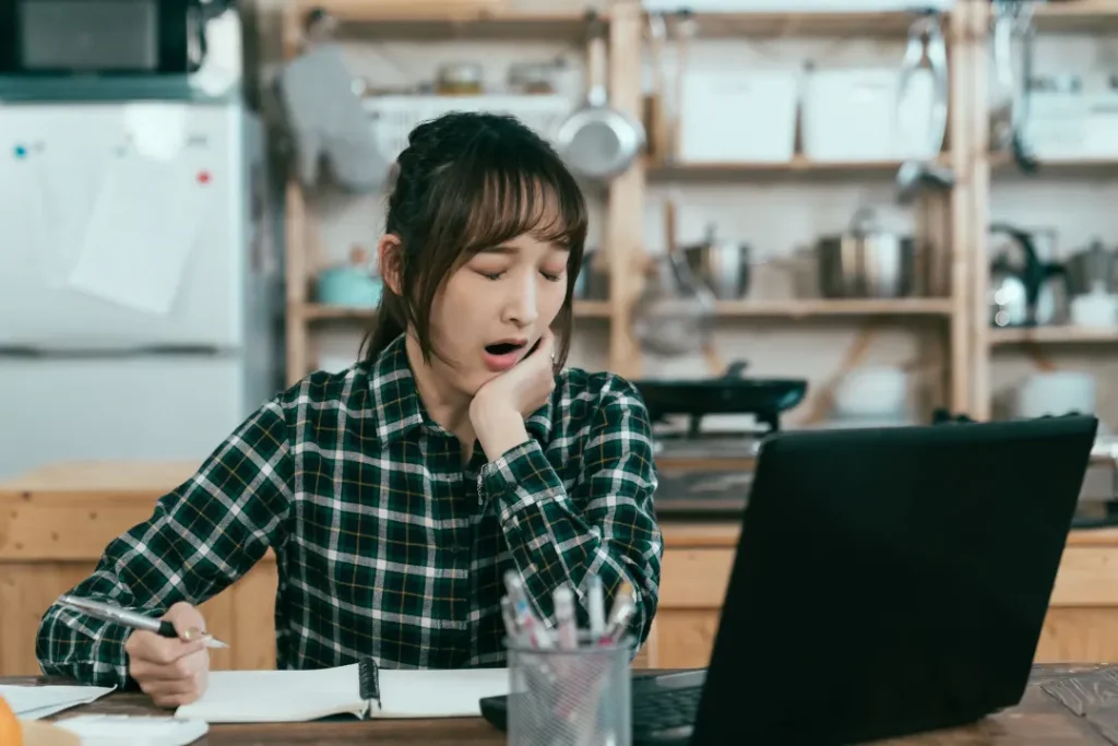 Woman unable to focus on her work due to daytime drowniness