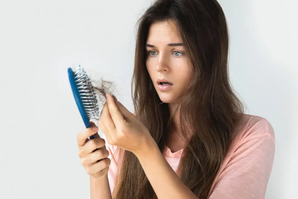 A lady facing hair loss. 