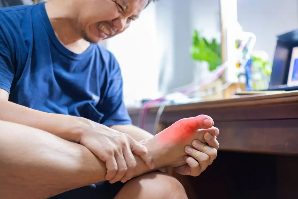 A man having pain in his foot. 