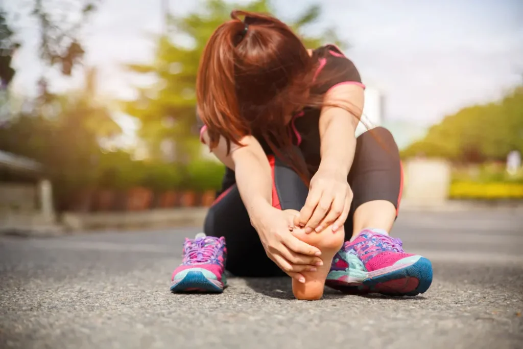 A lady having pain in her foot. 