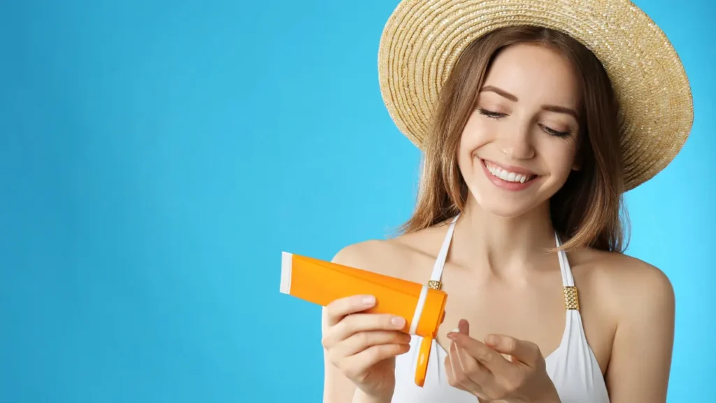 Lady using sun block for Sun Protection. 